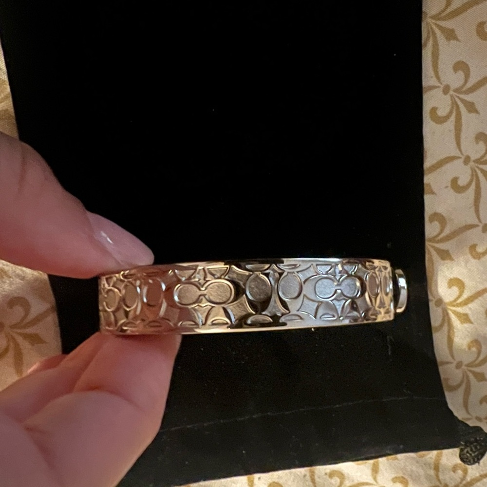 Coach silver bangle with clip closure